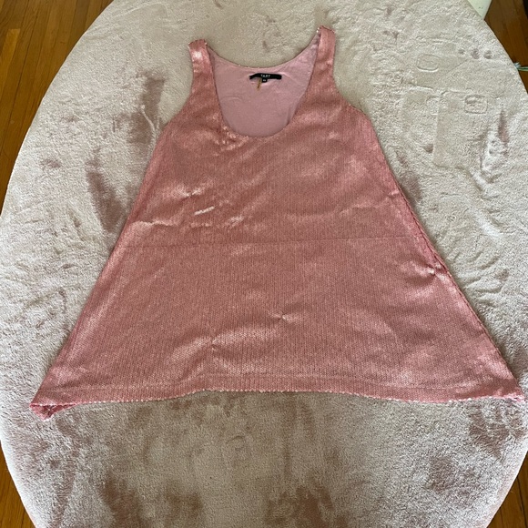 Shiny babydoll shirt. Stunning with a pair of heels and jeans. - Picture 8 of 15